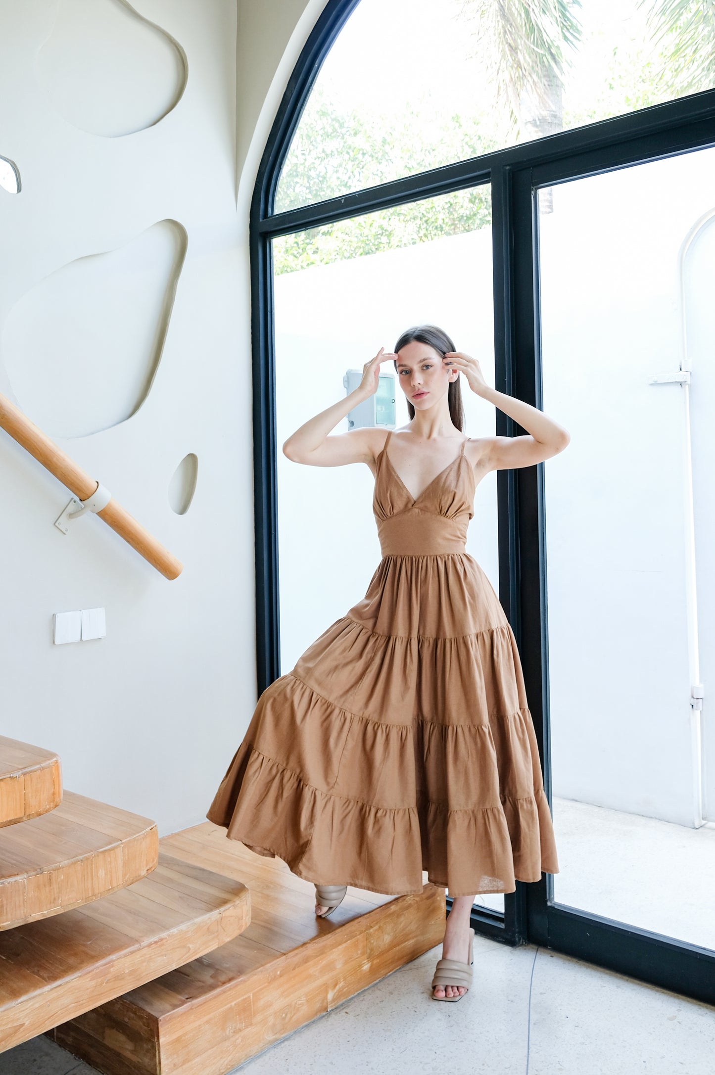 Flowy wide long dress made of linen fabric.for your comfortable hot summer days presented by a model.