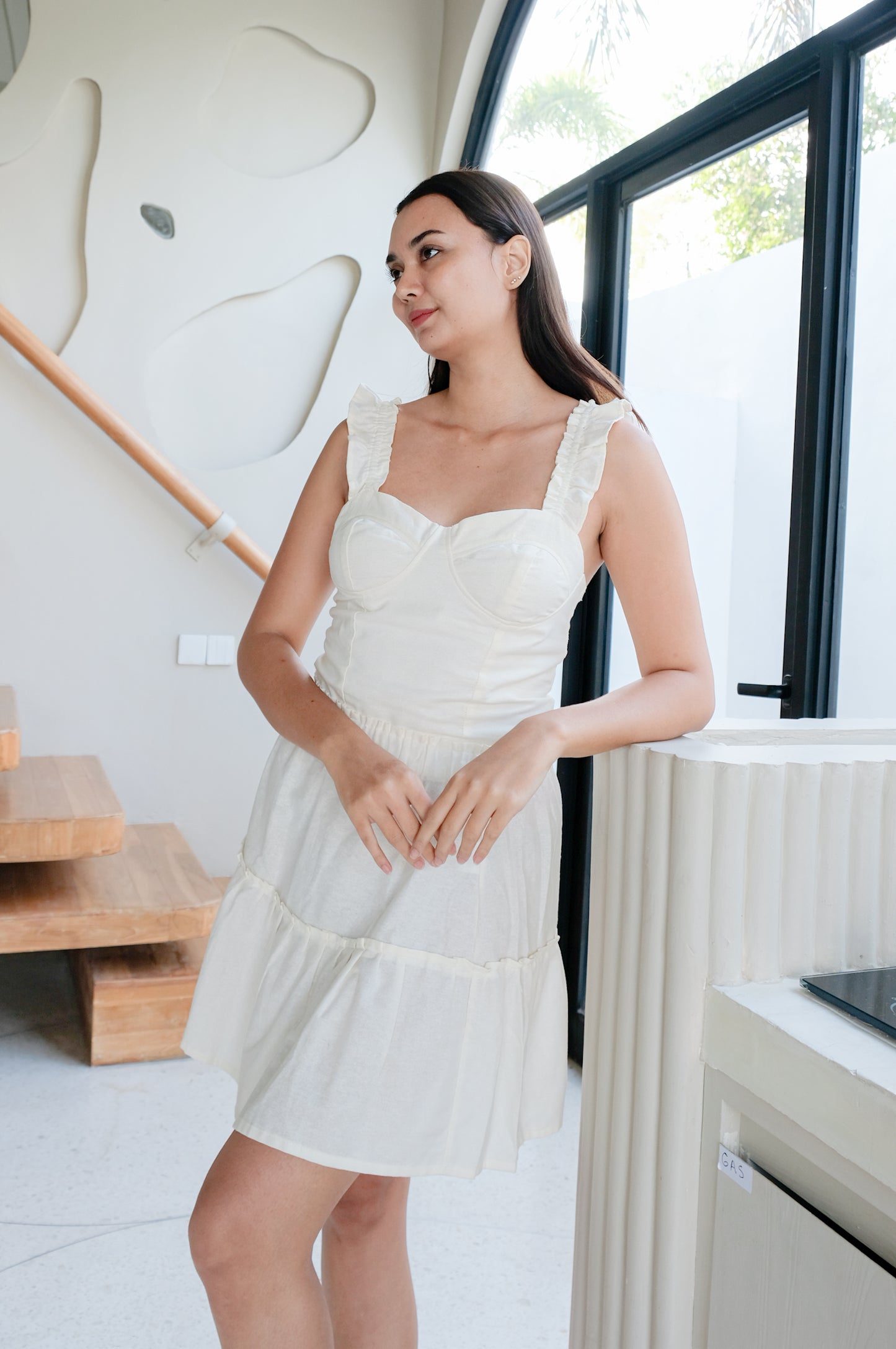Breathable linen white top and skirt on posing model by Una Linen Havn